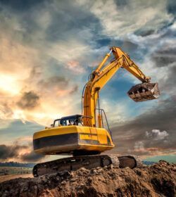 Crawler,Excavator,During,Earthmoving,Works,On,Construction,Site,At,Sunset