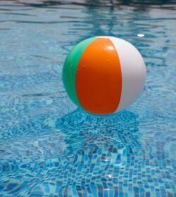 Beach,Ball,In,Pool.,Colorful,Inflatable,Ball,Floating,In,Swimming